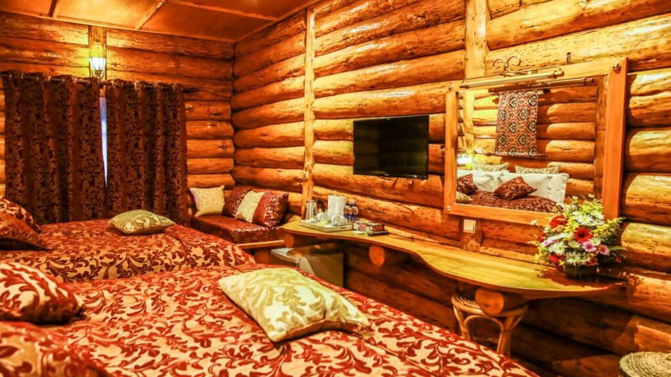 昆士伍德小屋酒店 - 奴娃拉伊利雅