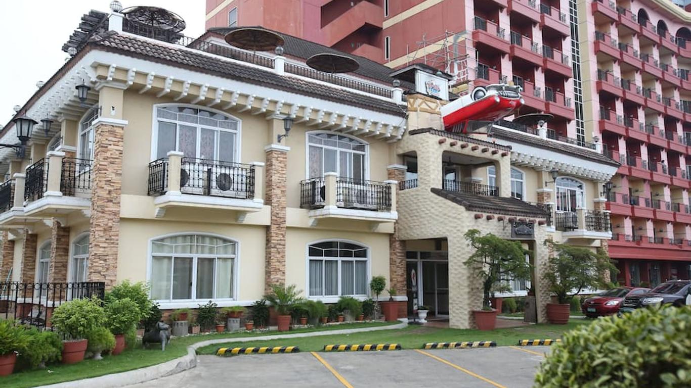 麥克坦皇冠麗晶套房酒店 - 拉普拉普