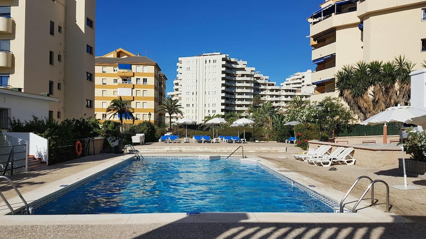 陽光海灘旅遊公寓酒店 - 班那馬德那